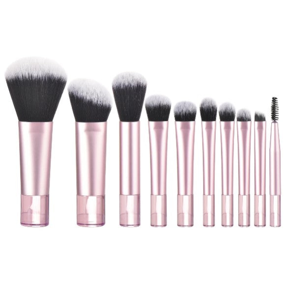10 piece light pink travel makeup brush set dimensions with triangle puff and 3 cosmetic sponges. Made with synthetic nylon fibers. Great for beginner makeup artists. Comes with blush brush, foundation brush, eyeshadow brush, eyeshadow smudger, eyeshadow detailer brush, angled eyebrow brush, lipstick brush and an eyebrow spoolie.