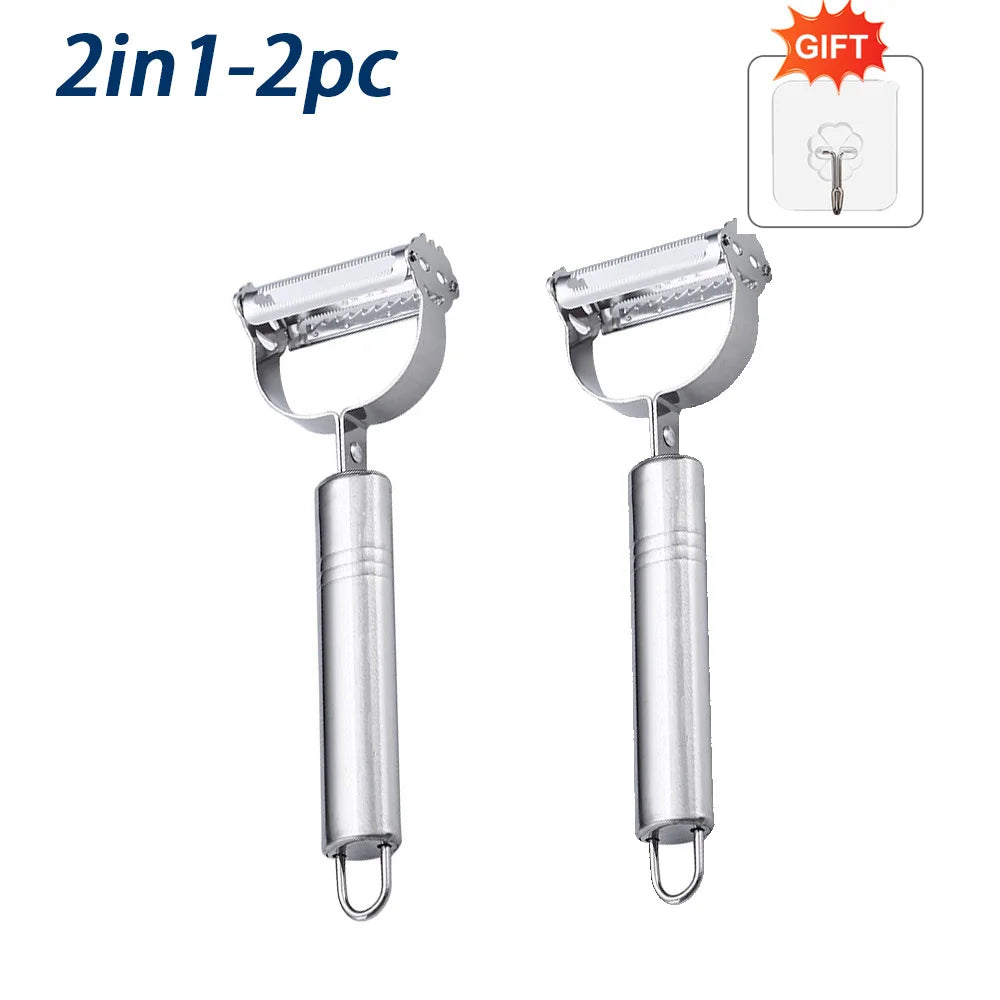 Two silver peelers kitchen tools with a hook on a white background, labeled '2in1-2pc' and 'GIFT'.